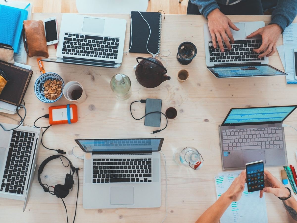 A QA team working around one table